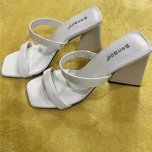 Unique white heeled sandals